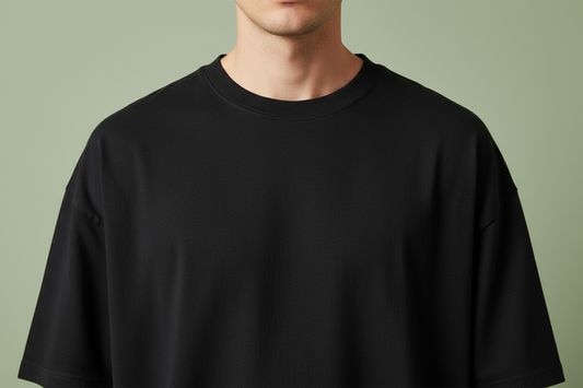 Black oversized drop shoulder t-shirt neckline and shoulder detail close-up